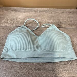 4 Piece V-Neck Bras Size L/XL In black, Gray, white, And Green     38